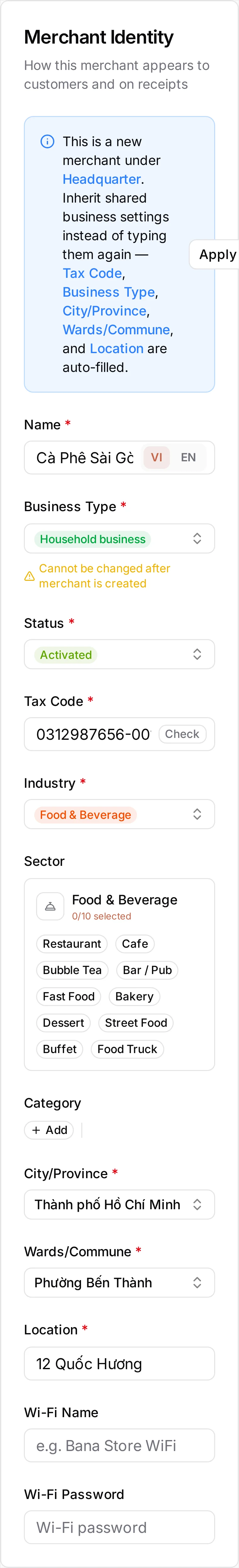 The completed Merchant Identity card for the branch: Name Cà Phê Sài Gòn Thảo Điền, Tax Code 0312987656-001, Status Activated, Business Type Household business marked 'Cannot be changed after merchant is created', Industry Food & Beverage, City/Province Thành phố Hồ Chí Minh, Wards/Commune Phường Bến Thành and Location 12 Quốc Hương. The blue Apply Headquarter Setup banner still sits above the fields